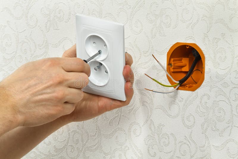 Installing an Electrical Outlet on the Wall Stock Photo Image of