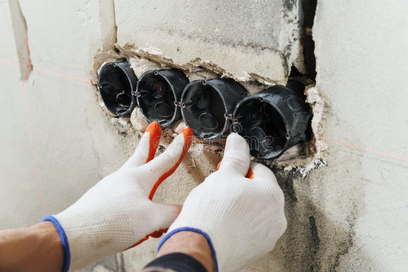 Installing Electrical Socket Box. Stock Image Image of home, repair