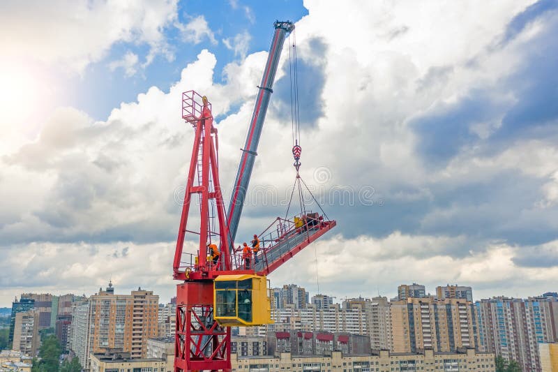Installing the Jib of a Construction Crane Using Another Crane on the