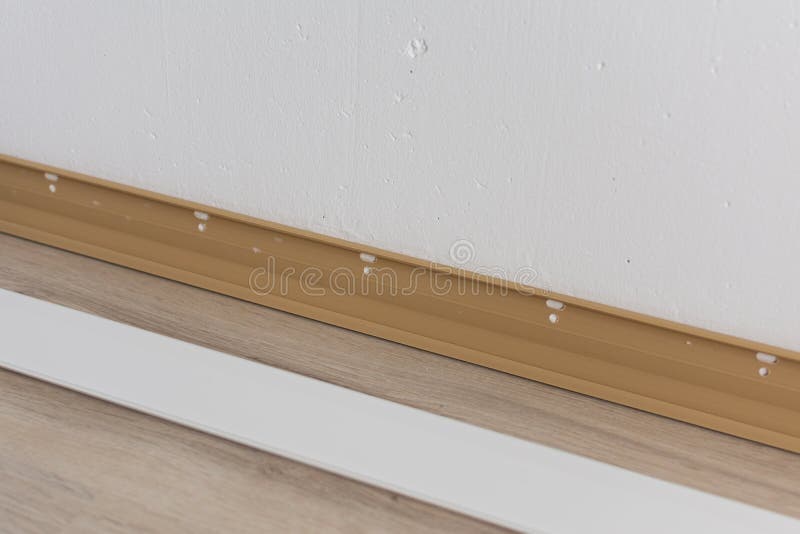 Installing Plastic Skirting Board In The Room Stock Image Image