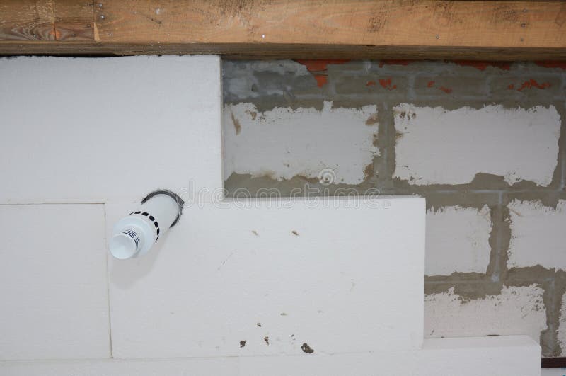 Installing Rigid Polystyrene Foam Board Insulation with Adhesive or