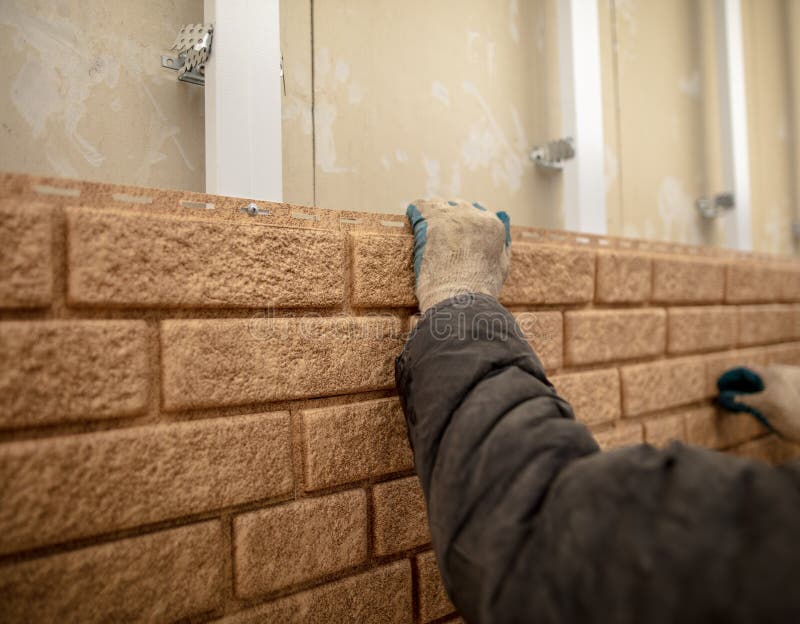 Installation of Plastic Siding Under the Brick Stock Image Image of