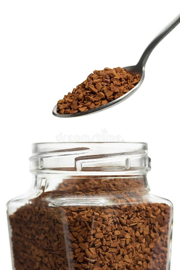 Open jar with instant coffee and a spoon