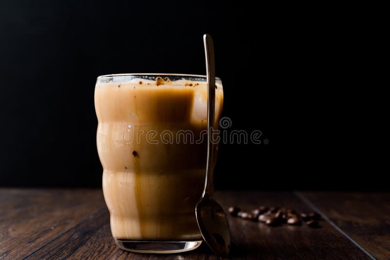 Instant Cold Coffee with Milk, Ice, Spoon and Coffee Beans. Stock Image