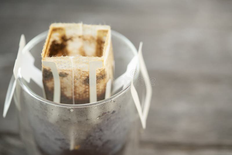 Instant Freshly Brewed Cup of Coffee, Drip Bag Coffee Stock Photo