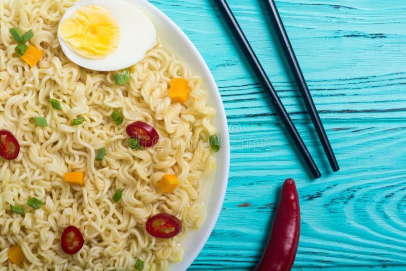 Instant noodles in bowl stock photo. Image of dinner - 126125336
