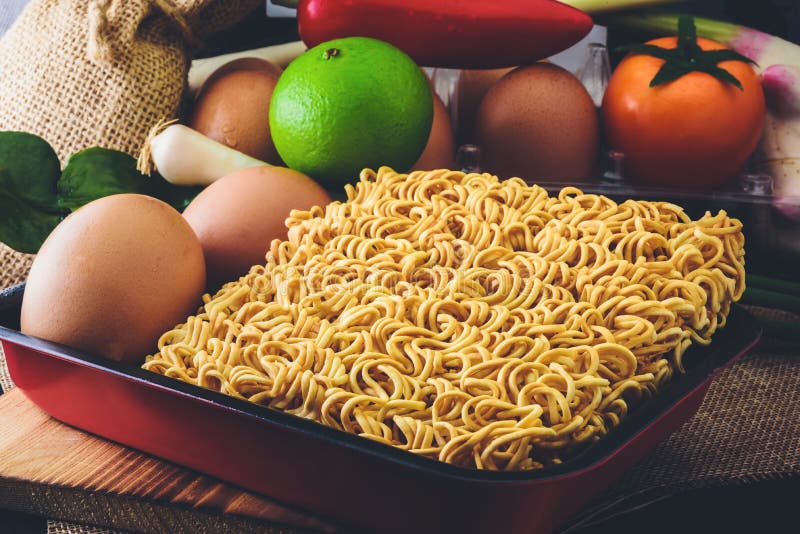 Instant Noodles that are Flavored with Ingredients and Fast Food Stock