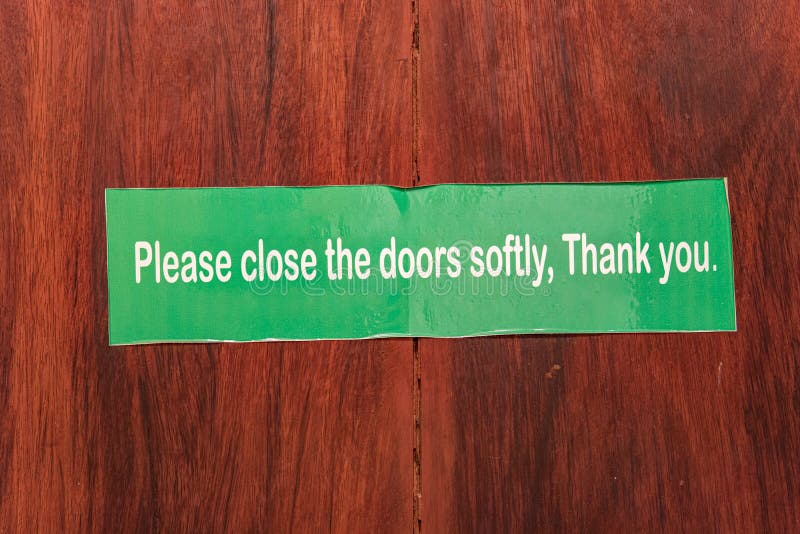 The instruction inscription for carefully close the door