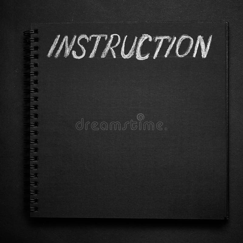Instruction Word Written on a Notepad with Blank Space. Blank Black