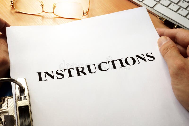 Instructions in a blue folder. Guidebook concept stock photos