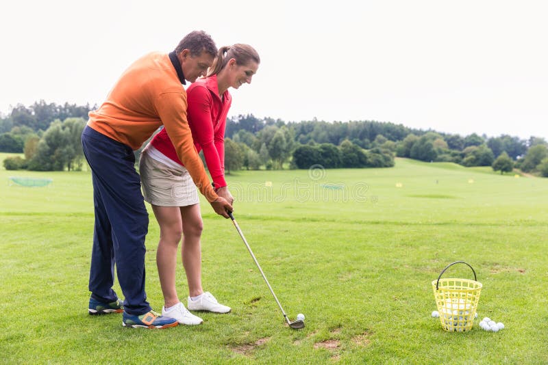 Instructor Teaching Female Golf Player Stock Image Image of caucasian