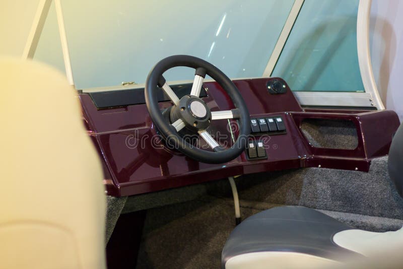 Instrument Panel and Steering Wheel of a Motor Boat Cockpit Yacht