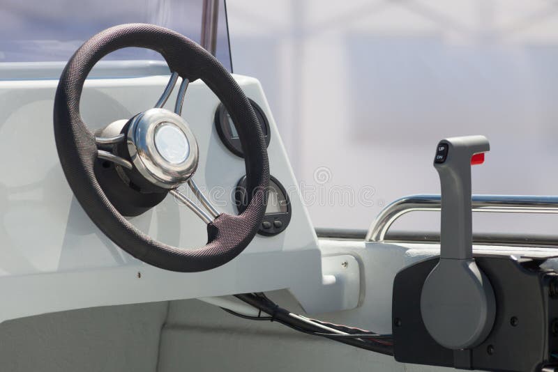 Instrument Panel and Steering Wheel of a Motor Boat Cockpit Yacht