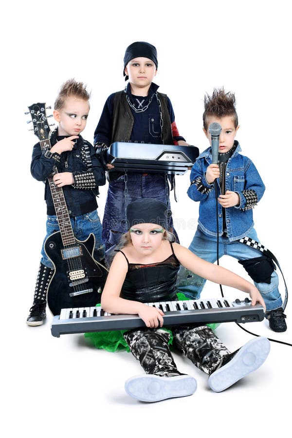 Group of children singing in heavy metal style. Shot in a studio. Isolated over white background. Group of children singing in heavy metal style. Shot in a studio. Isolated over white background.