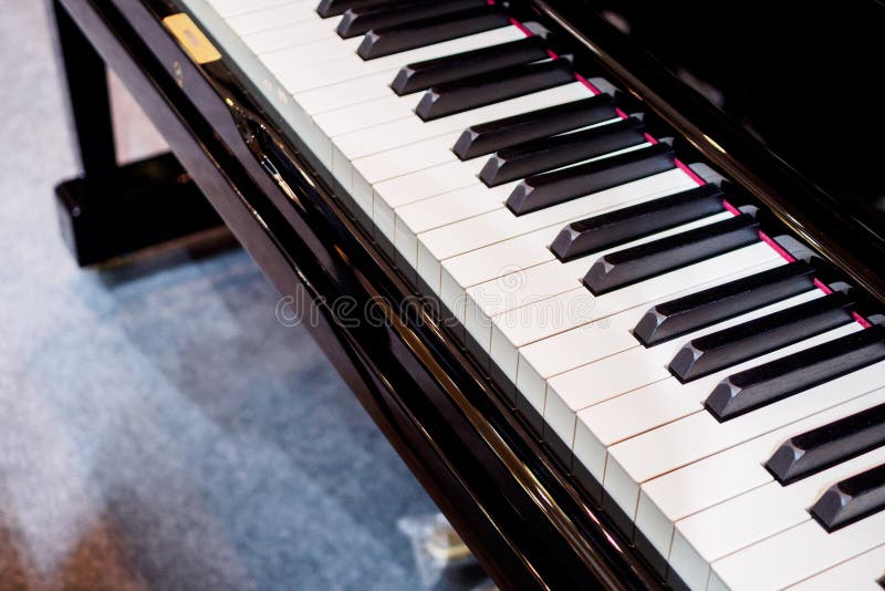 Instrumento musical do fundo do teclado de piano fotografia de stock Instrumento musical do fundo do teclado de piano fotografia de stock