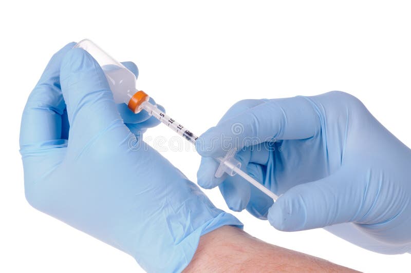 Insulin bottle extraction royalty free stock images