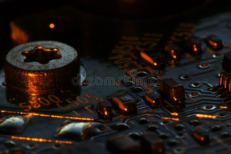 Integrated Circuit Background. Close Up Texture of Integrated Circuit from a Hard Disk Drive. Computer Hardware Background.