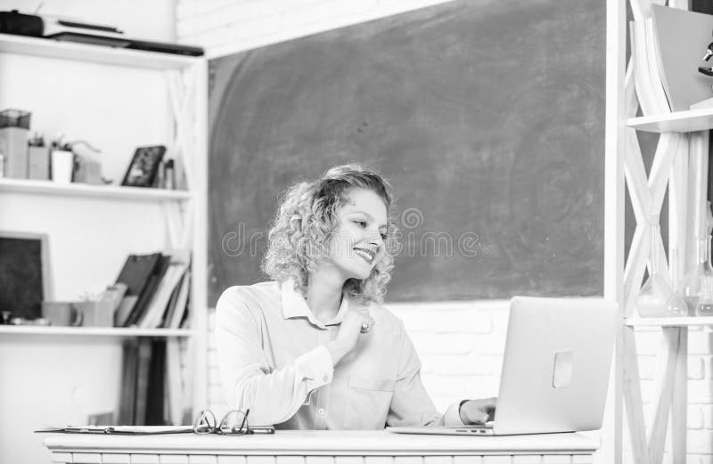 Intelligent girl student. Online community for teachers. Teachers day. Modern school. Woman work online. Distance royalty free stock image Intelligent girl student. Online community for teachers. Teachers day. Modern school. Woman work online. Distance royalty free stock image
