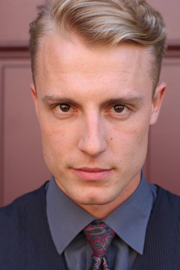 Intense dark portrait of a handsome man with scary eyes stock image Intense dark portrait of a handsome man with scary eyes stock image