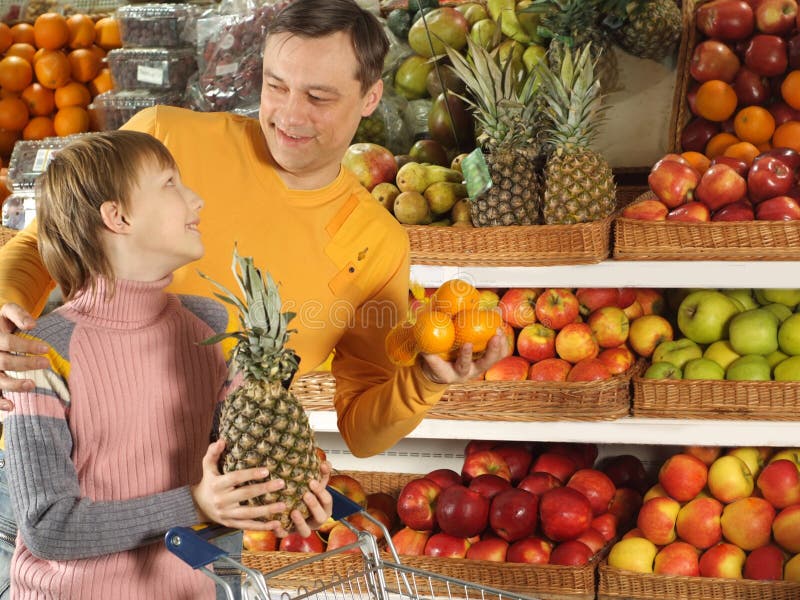 Fun boy with dad in the store stock photo Fun boy with dad in the store stock photo