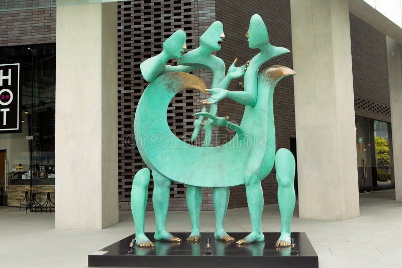 Interestingly Bronze Sculpture on the Street, Singapore Editorial Image