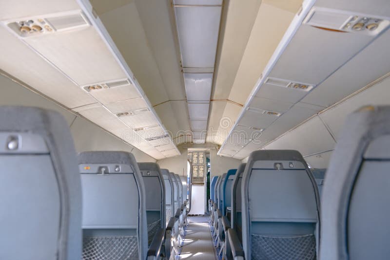 Interior of an airplane with many seats