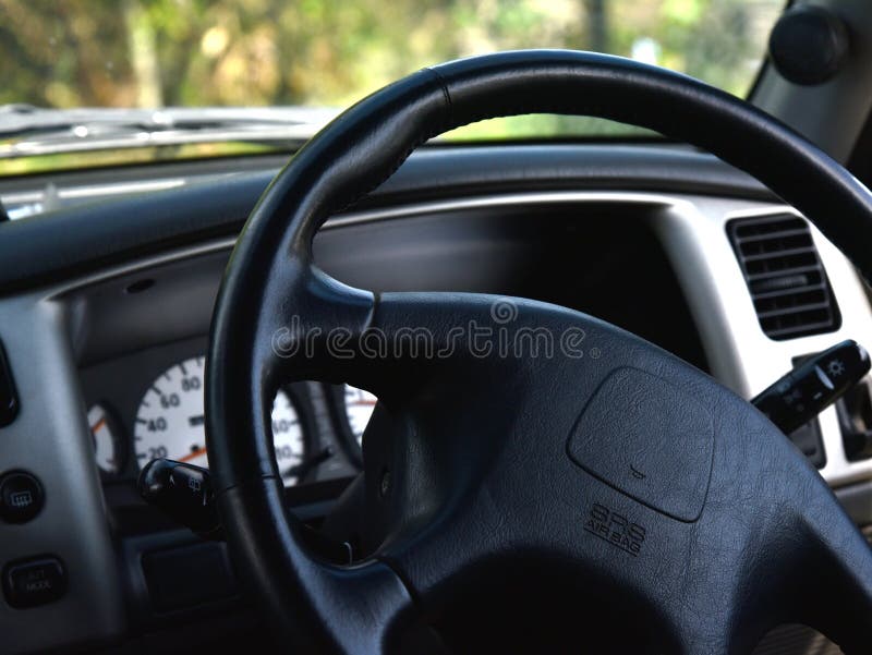 Interior automobilístico do carro do volante fotografia de stock Interior automobilístico do carro do volante fotografia de stock