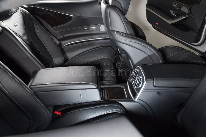Interior of a Black Car Under the Lights Transportation Concept Stock