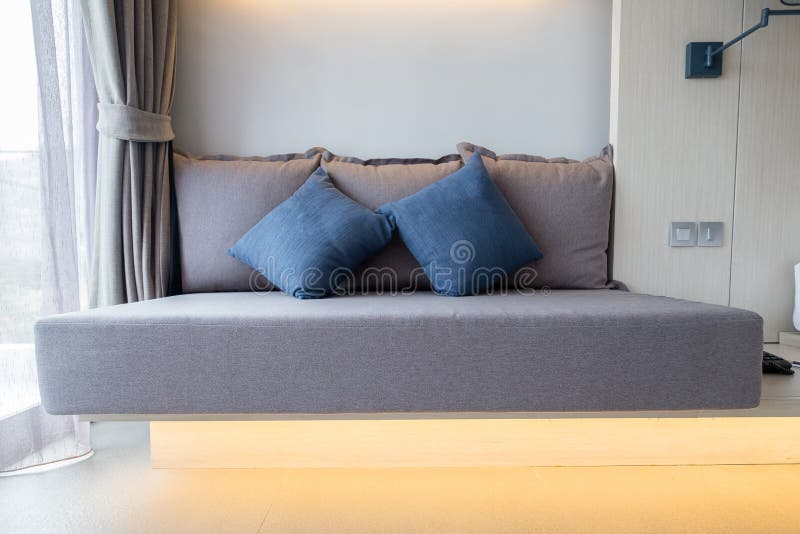Brown Sofa with Blue Pillows in Bedroom Stock Image Image of healthy