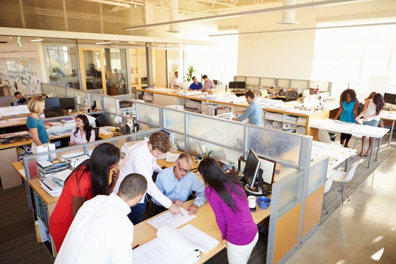 Interior Of Busy Modern Open Plan Office With People