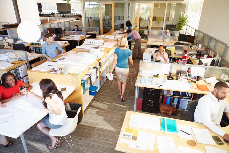 Interior Of Busy Modern Open Plan Office With People