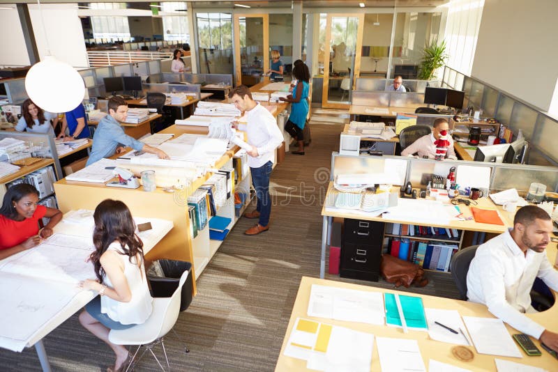 Interior Of Busy Modern Open Plan Office With People