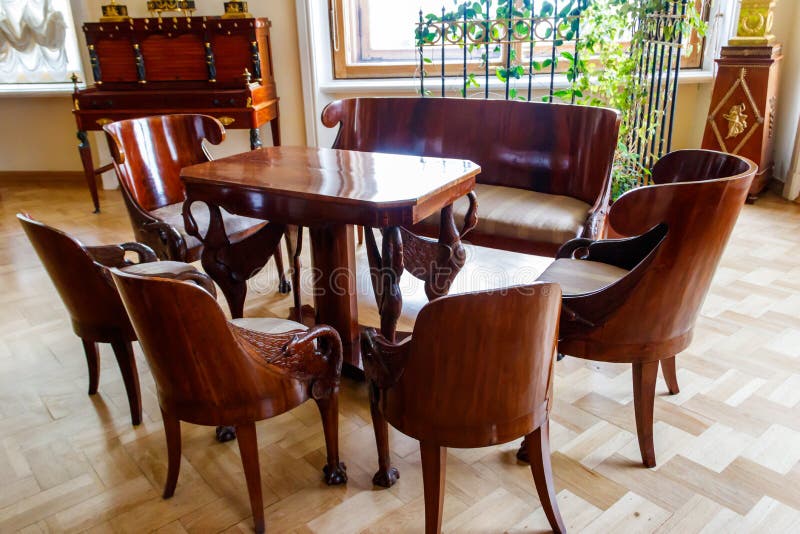 Interior of Classical Luxury Dining Room with Wooden Table and Chairs