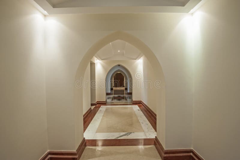 Interior corridor of large villa with arches