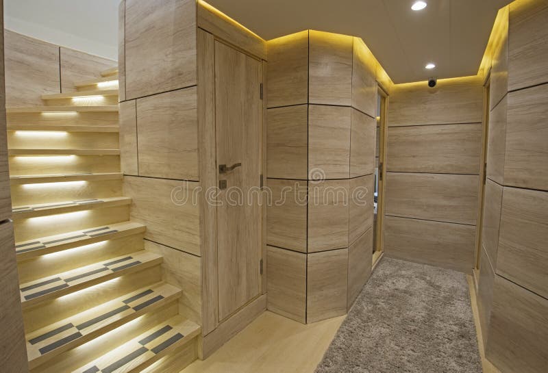 Interior corridor area of luxury motor yacht with staircase