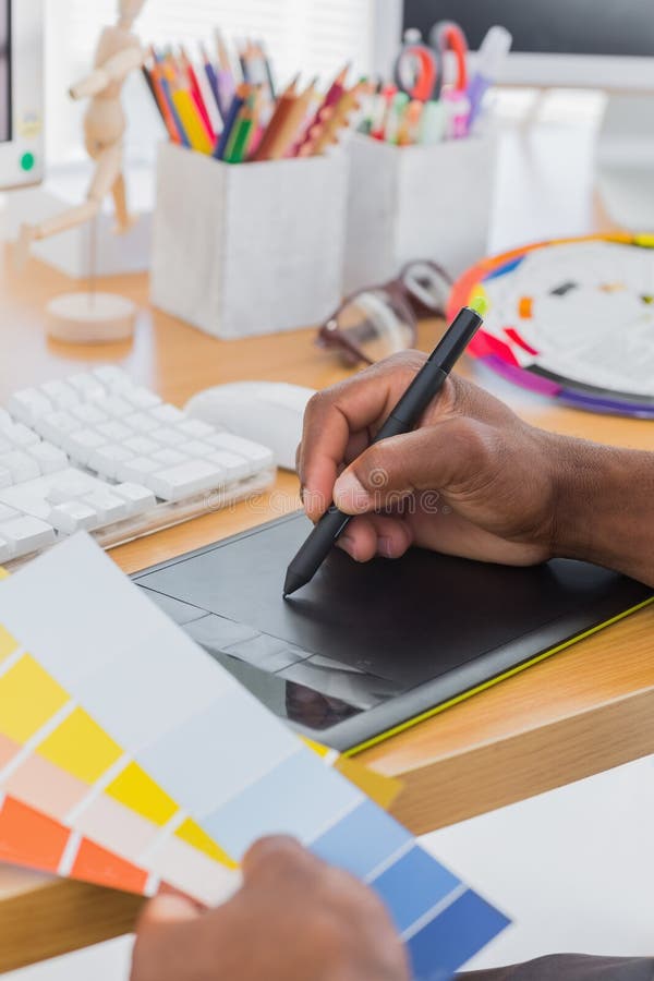 Interior Designer with Graphics Tablet and Colour Chart Stock Image