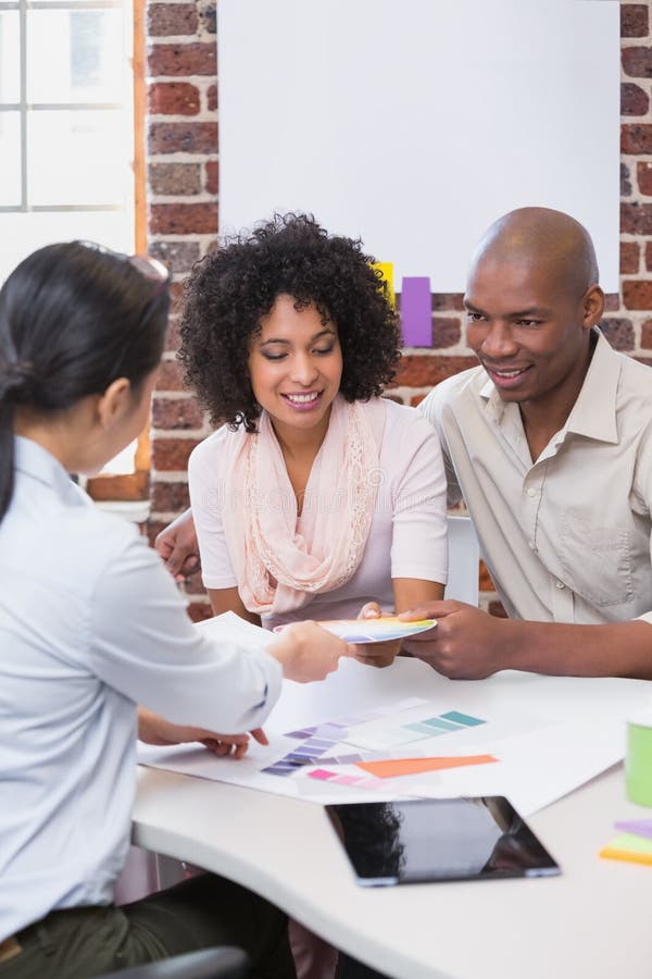 Interior Designer Speaking with Clients Stock Image - Image of woman ...