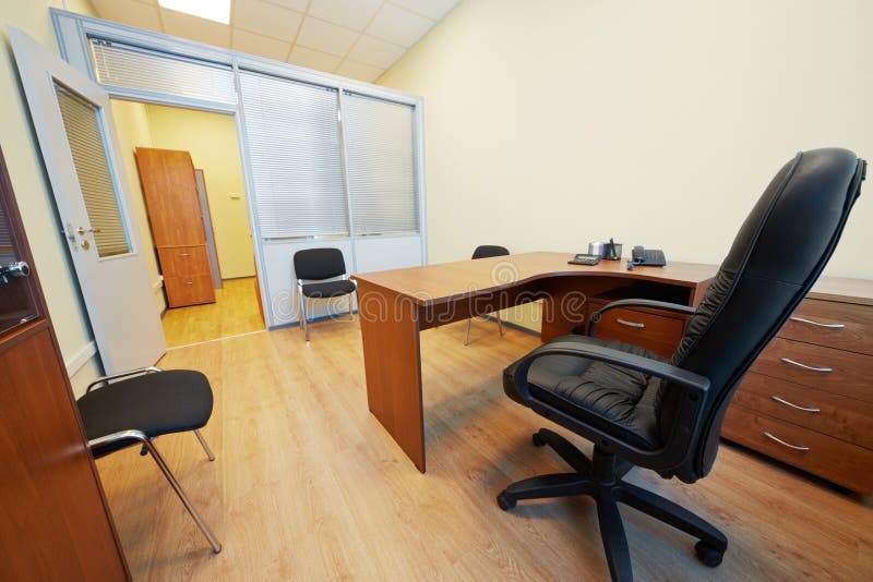 Interior of empty office cabinet with armchair stock photo