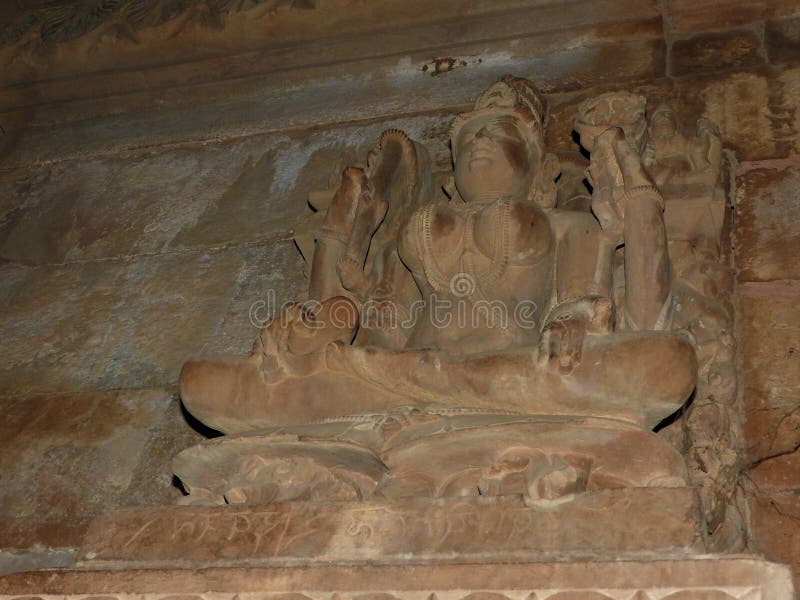 Interior, en las paredes de los antiguos templos Kama Sutra en la India kajuraho Patrimonio de la Humanidad de la UNESCO El punto foto de archivo Interior, en las paredes de los antiguos templos Kama Sutra en la India kajuraho Patrimonio de la Humanidad de la UNESCO El punto foto de archivo