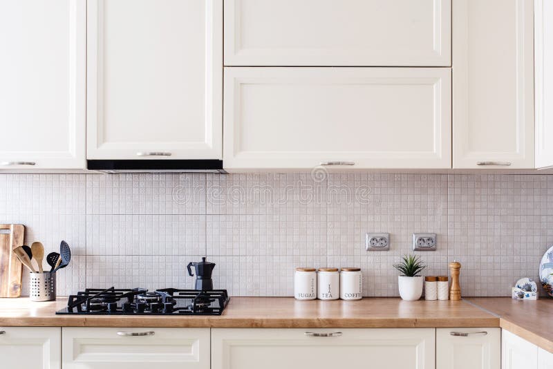 Interior kitchen design details - modern cabinets and wooden furniture royalty free stock image Interior kitchen design details - modern cabinets and wooden furniture royalty free stock image