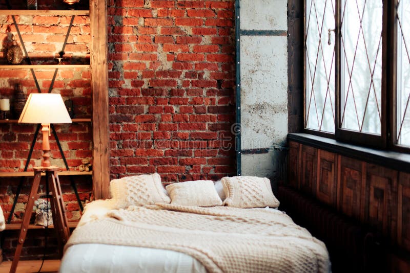 Interior with a Large Bed and a Brick Wall Stock Image Image of cozy