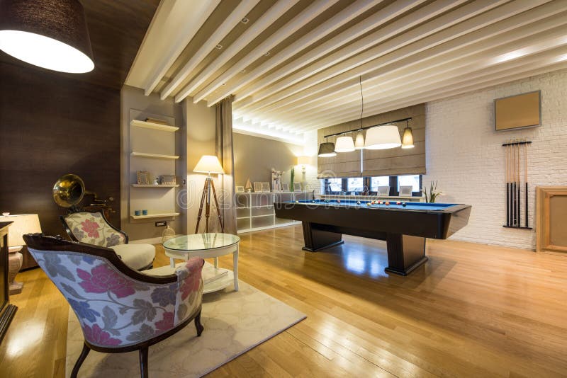 Interior of a Luxury Living Room with Billiard Table Stock Photo