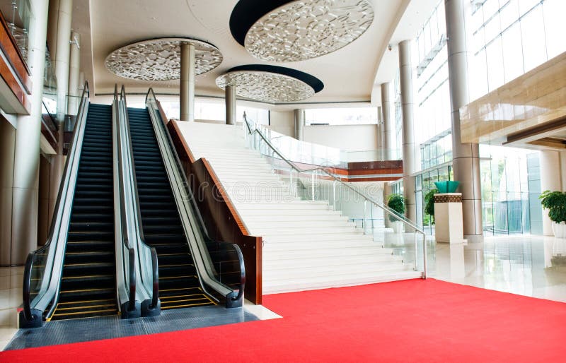 Two escalators and stairs in new modern building. Two escalators and stairs in new modern building.