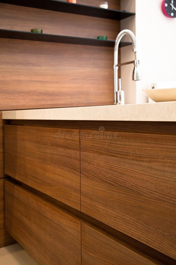 Interior Of Modern Kitchen White And Walnut Cabinets Stock Photo