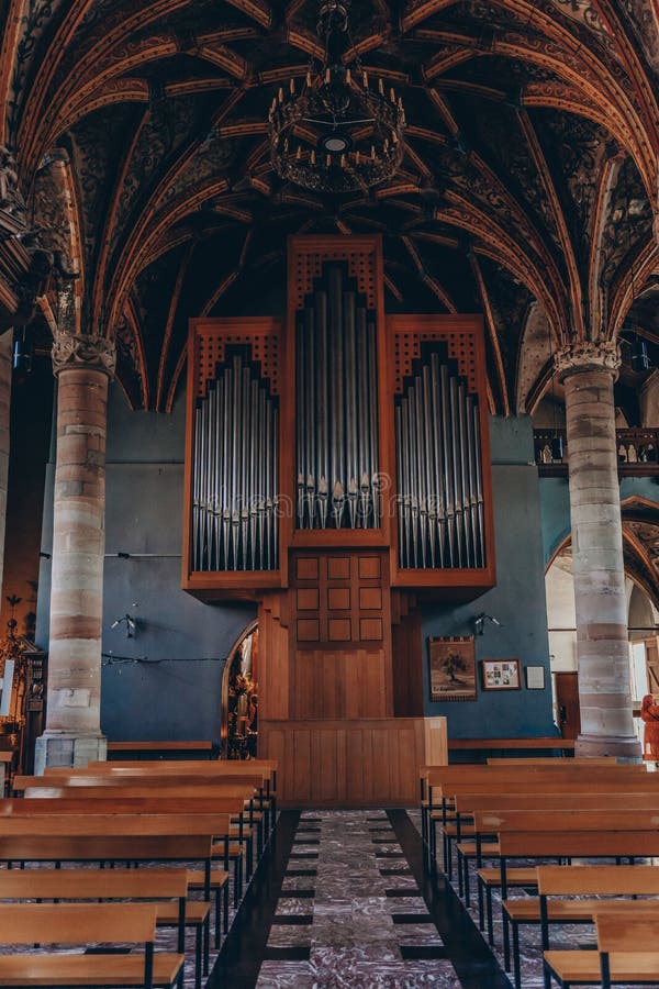 Interior of an Old Eglise SaintPierre Church in a Vertical Shot Stock