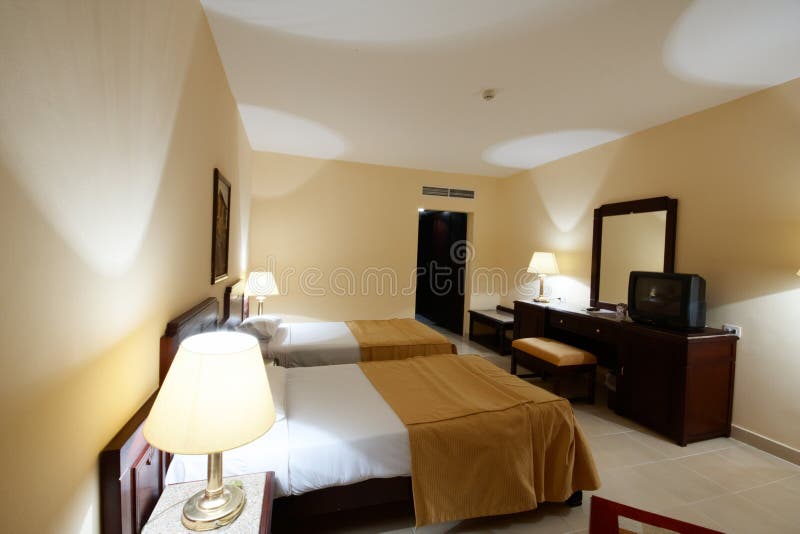 Interior of room with two beds in hotel