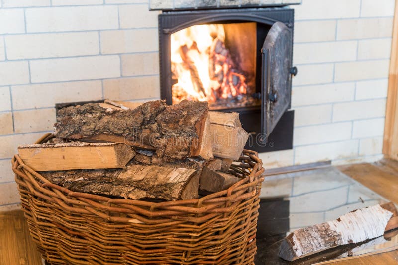 The Interior of the Russian Bath with Wood and a Burning Stove. Stock