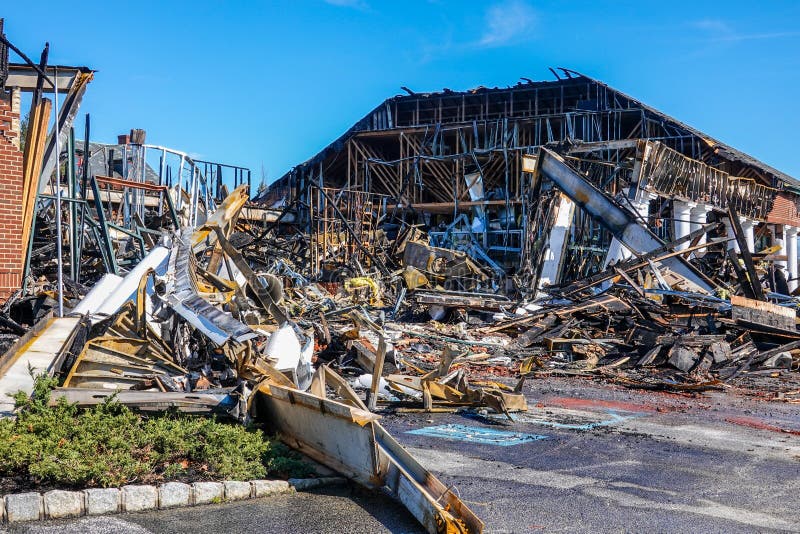 The interior structure of a building destroyed by fire full of debris. stock images
