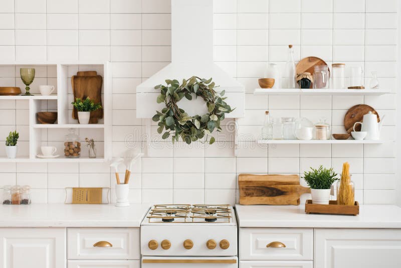 Interior of a Stylish Cozy Modern White Wooden Kitchen Stock Image