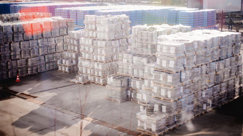 Interior warehouse. pallets with bottles stand in rows stock